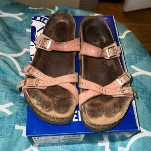 Used and worn Birkenstock sandals!